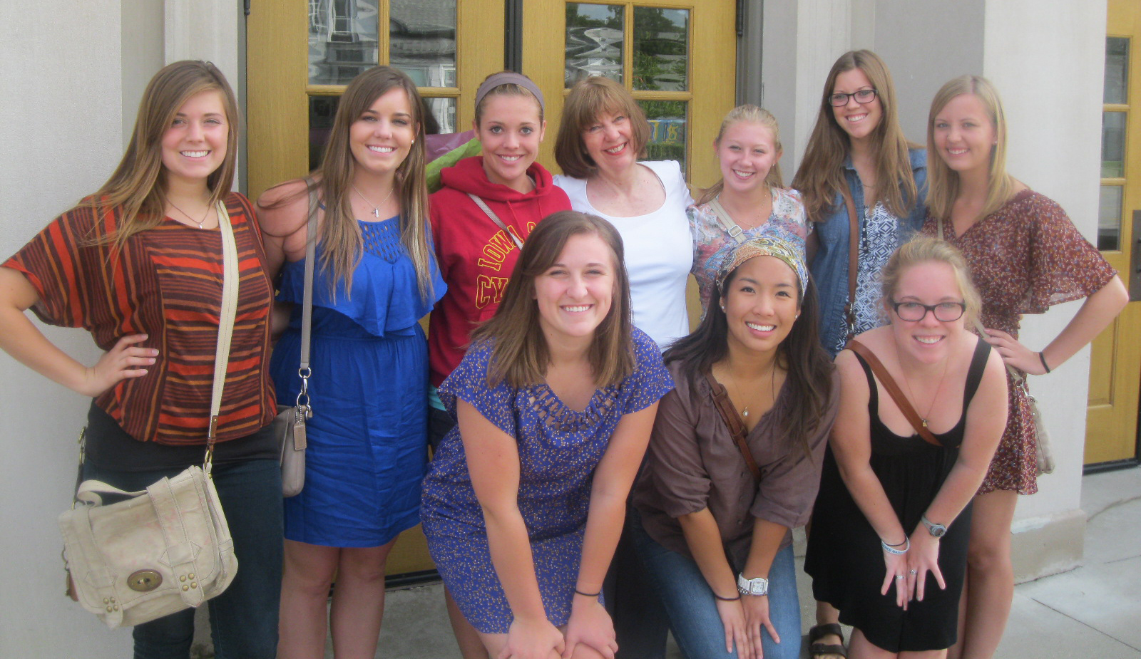 Members of the Pi Beta Phi executive board pose with Jane Cox after her Aug. 26 performance of The Yellow Rose of Suffrage.