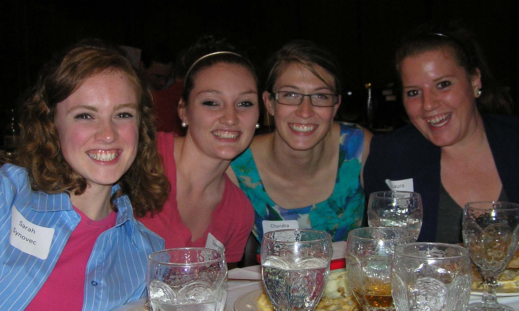 Catt Center interns Sarah Synovec, Sawyer Baker and Laura Wentworth are pictured at the leadership dinner with Chandra Peterson, Legacy of Heroines scholar.