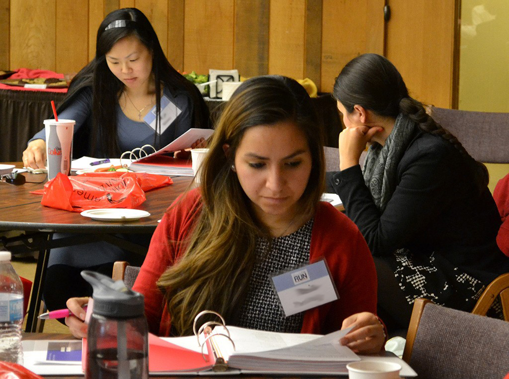 Ready to Run attendees read over materials during the Feb. 13 workshop.