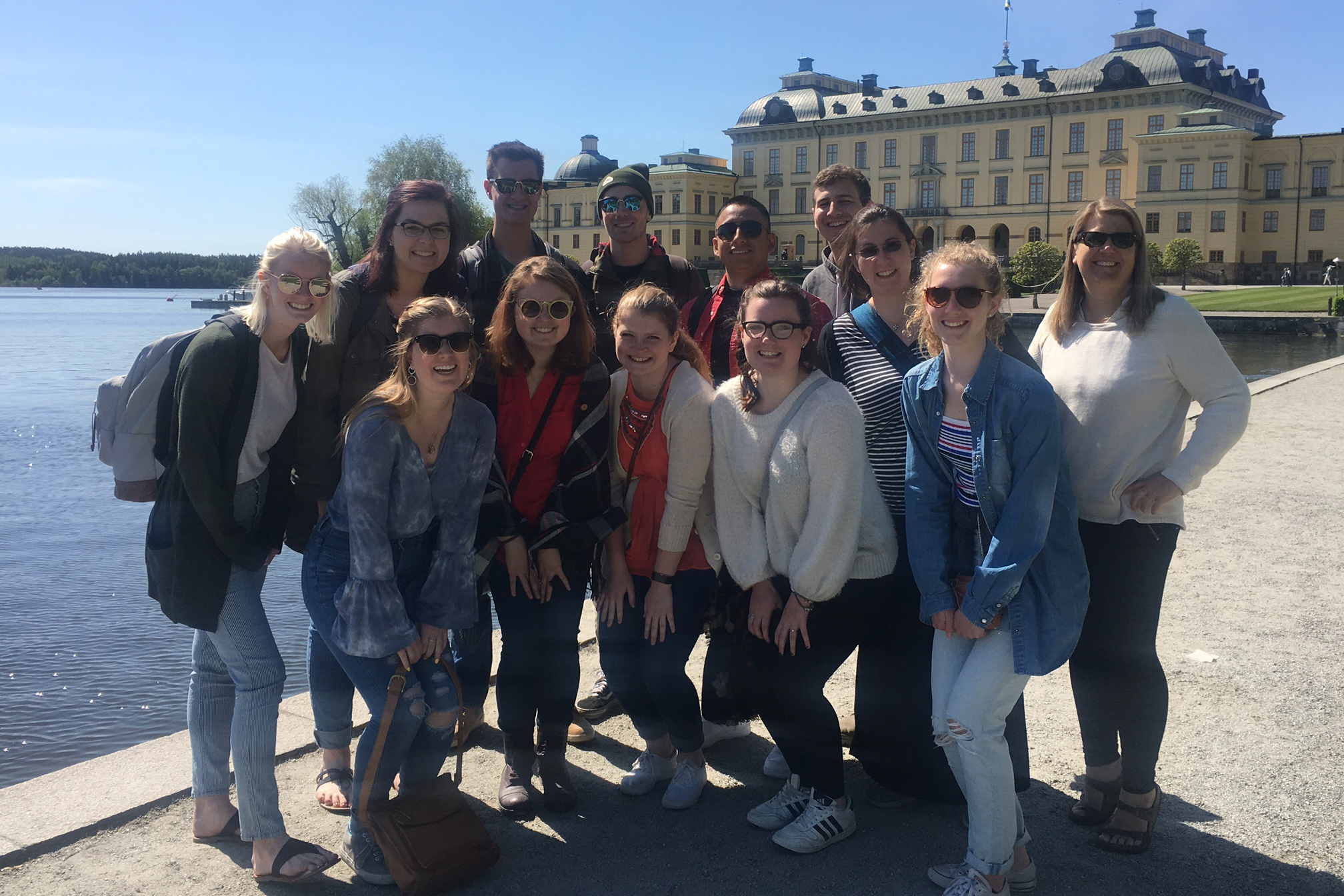 Widner (far right) and the students enjoyed a boat ride to Drottningholm Palace.