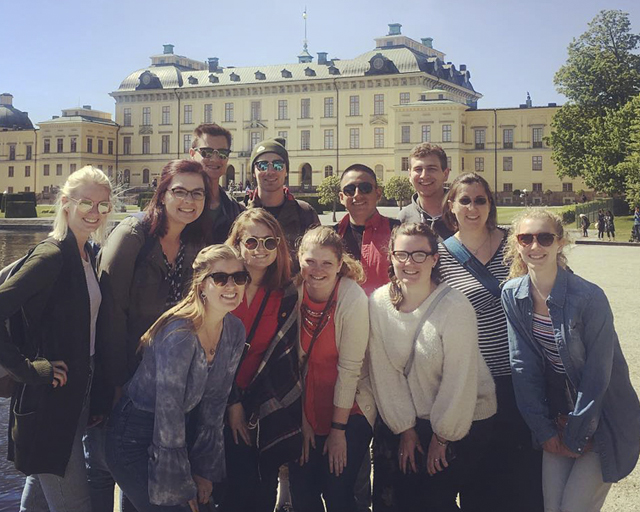 Widner and students enjoying a boat ride to Drottningholm Palace on the 2018 trip