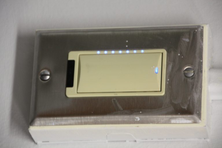 Motion-activated light switch with dimmer and auto shutoff. The room is much brighter!