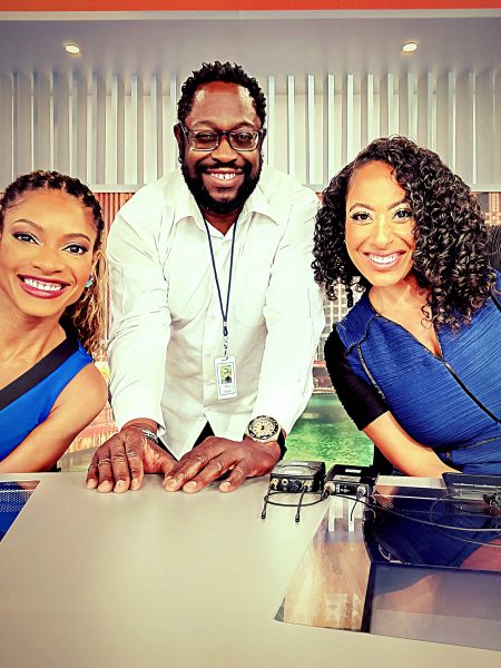 Tony Moton poses CBS 2 Chicago news anchors Mugo Odigwe (left) and Audrina Sinclair on the station's new set, one of the recent developments led by Iowa State alum Jennifer Lyons. 