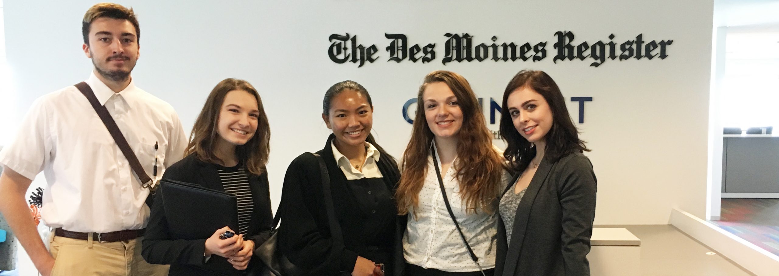 five members of Journalism Learning Community in the Des Moines Register newsroom