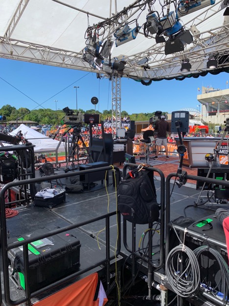 The College GameDay set with lights, cords, and other stage elements.