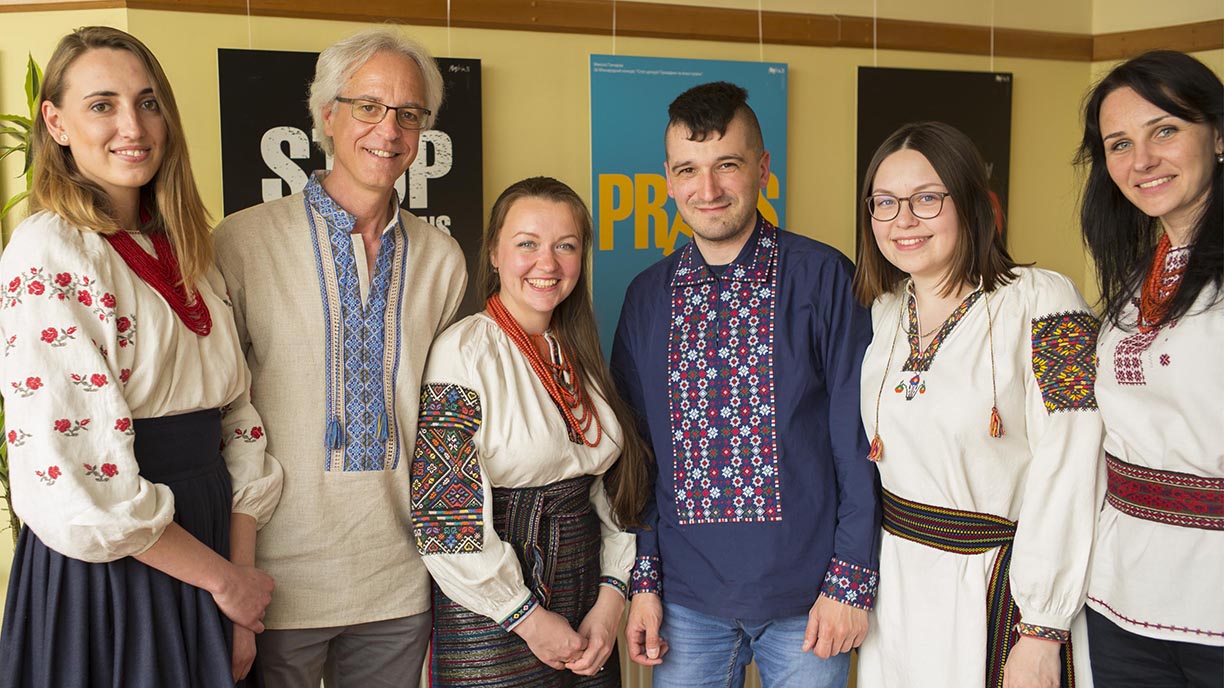 a group of six people in traditional Ukrainian dress