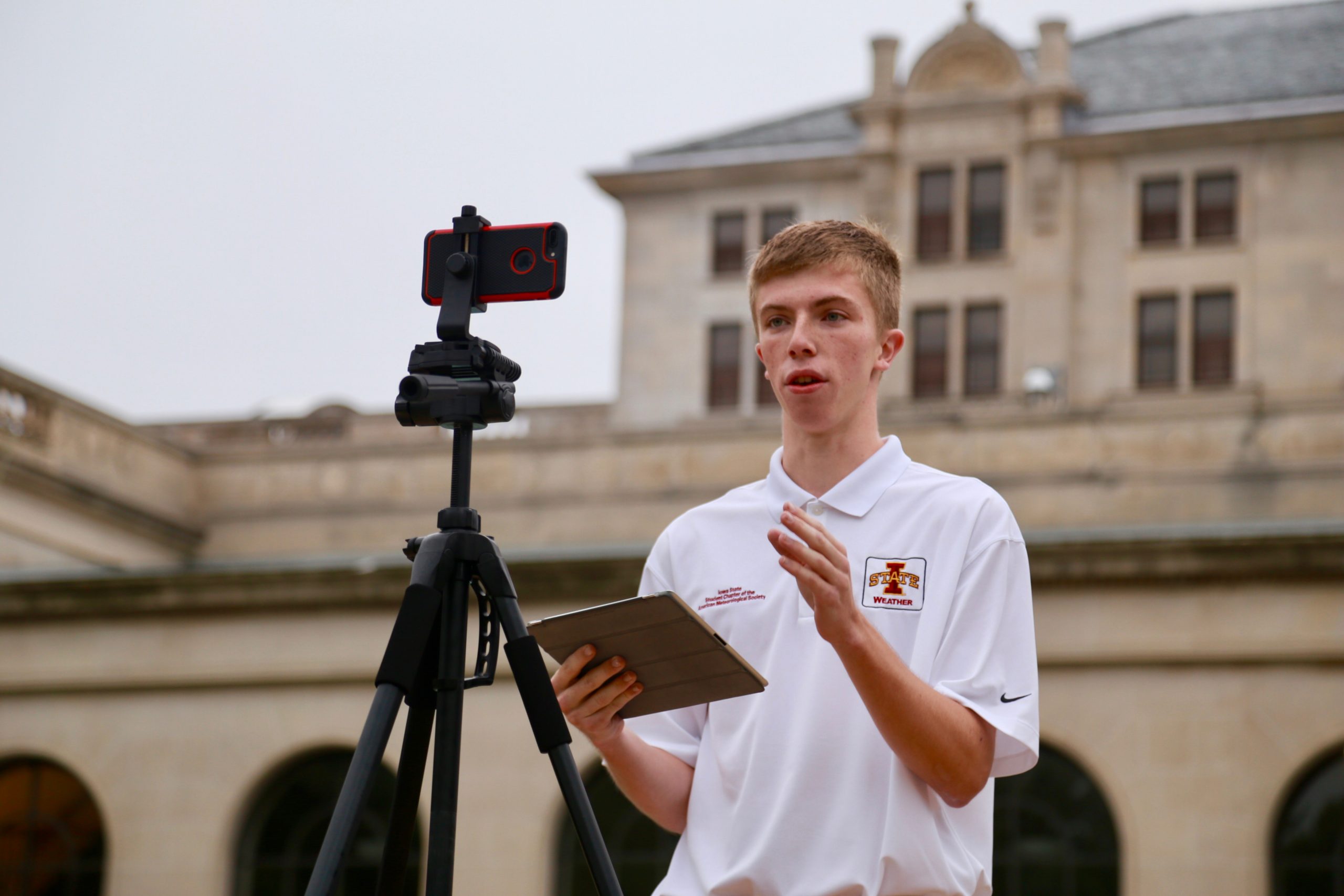 Senior Jacob Vos reporting the weather on campus.