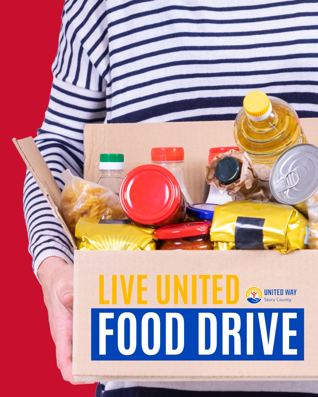 A person wearing a navy and white striped shirt holding a box of non-perishable food items like pasta, canned goods, and bottled oil. The box features a label reading 'LIVE UNITED FOOD DRIVE' with the United Way of Story County logo.