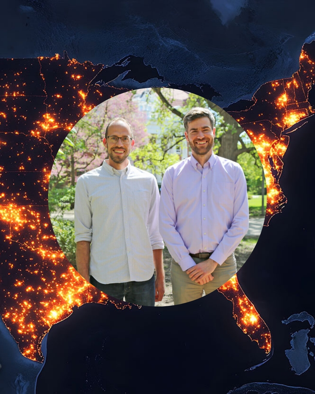 Two smiling men stand side by side outdoors on a sunny day, framed within a circular cutout overlaid on a nighttime satellite image of the United States showing bright clusters of lights across the country. The background behind them shows green trees and blooming pink flowers, suggesting a spring setting.