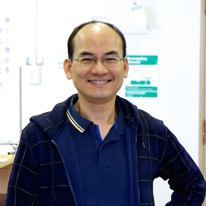 Edward Yu standing in his lab.