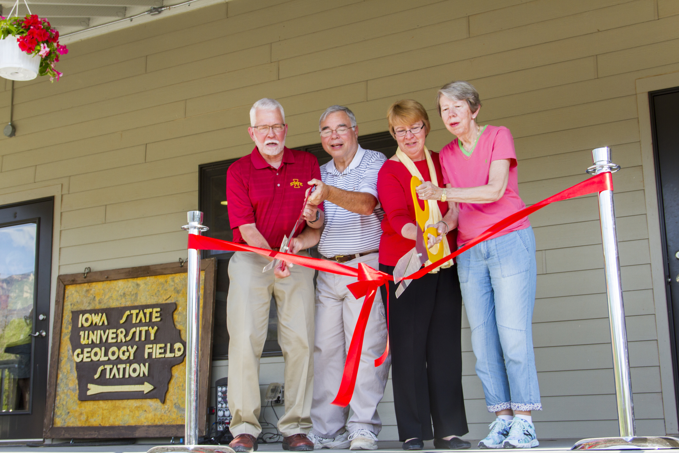 Dean Beate Schmittman and others cut the ribbon at the Geology Field Station.