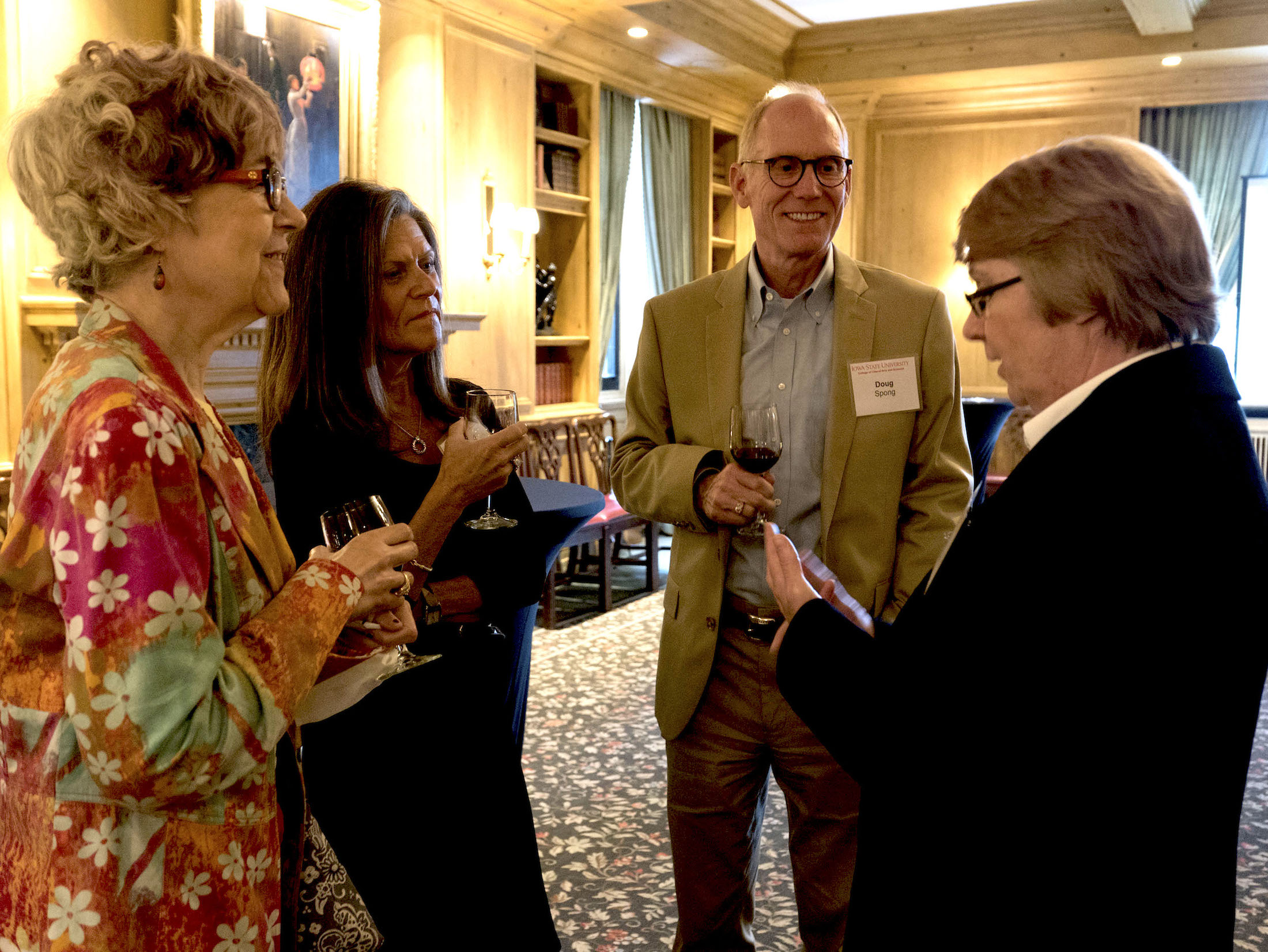 Dean Beate Schmittmann mingles with guests.