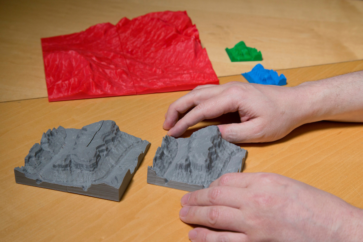 A close up of a 3-D model of the Grand Canyon.