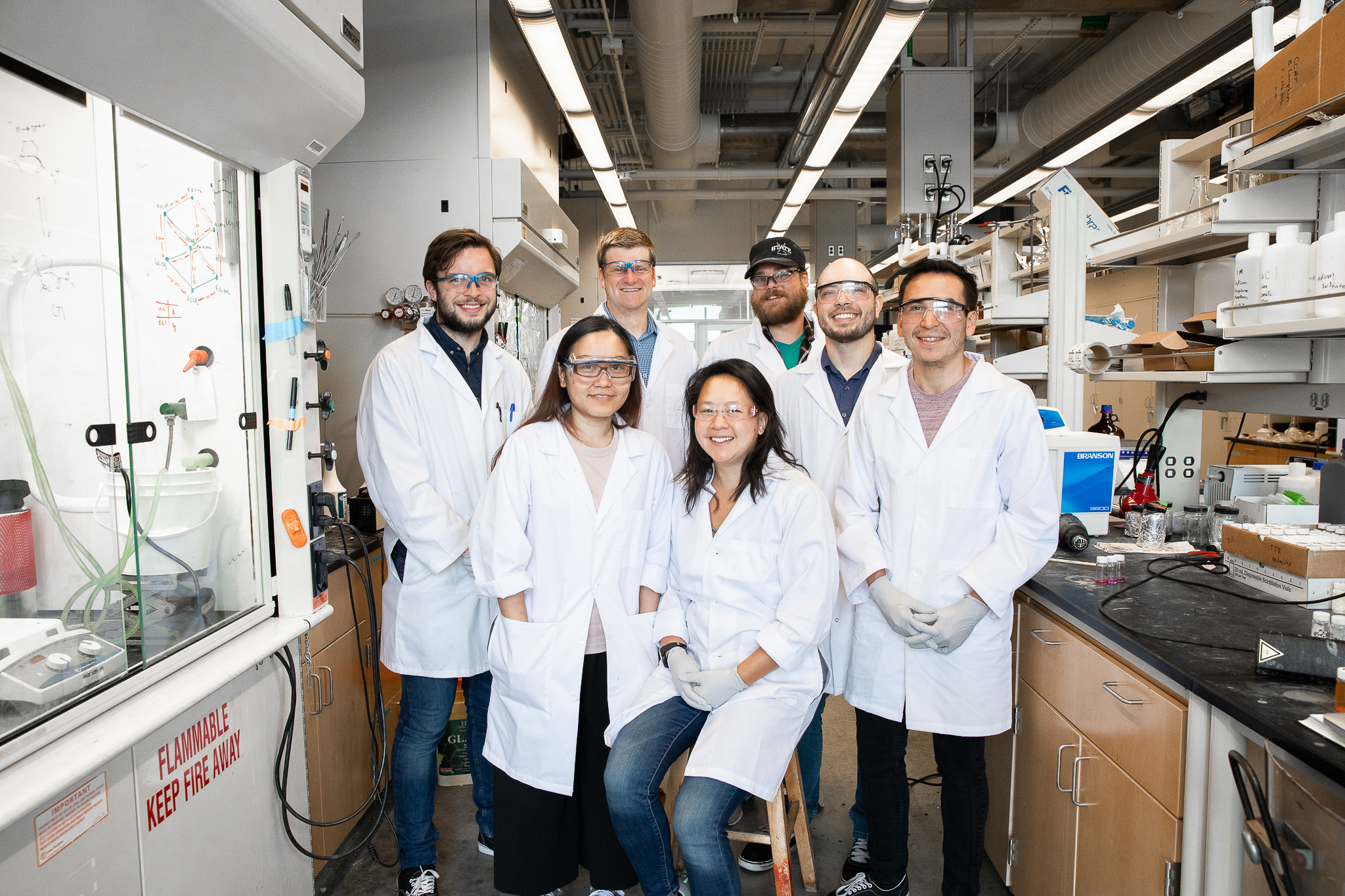 Dr. VanVeller and his team of research students pose in the lab