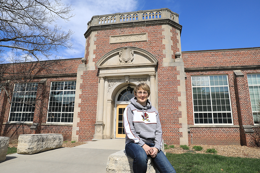 Jen Scharff poses in front of the Physics Building on the Iowa State campus