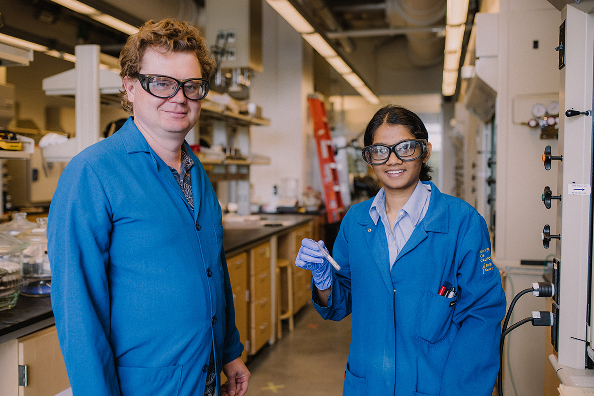 Kirill Kovnir stands next to chemistry student Nethmi Hewage as they pose for a photo in Kovnir