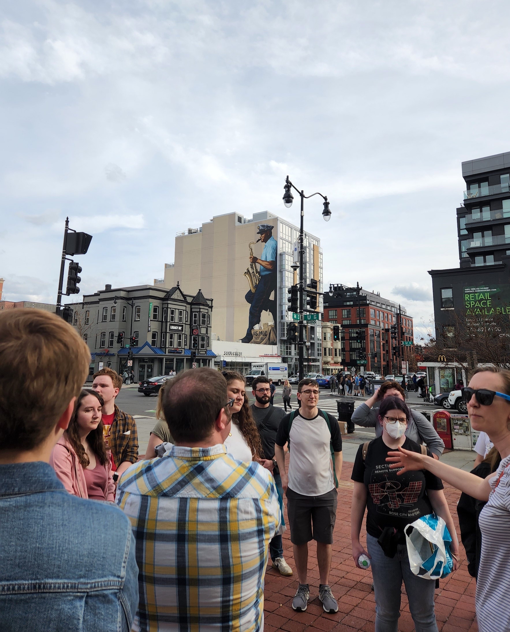 Students participated in a walking tour of U-Street, a historic Black neighborhood in Washington, D.C. Pictured in the background is the city