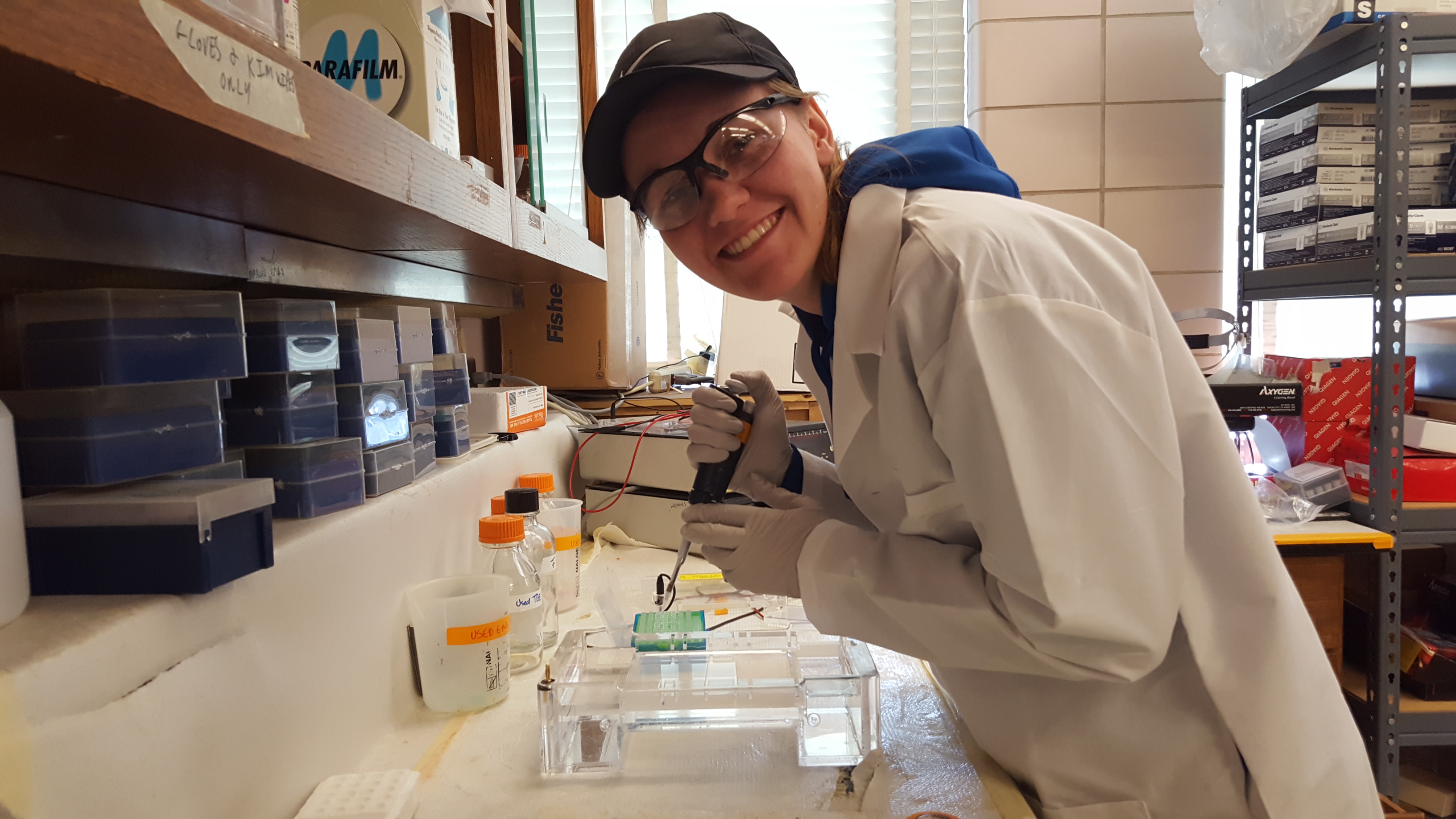 Natalie Vance works with lab equipment in a science lab.