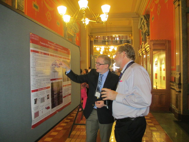 A student presents research in the capitol.