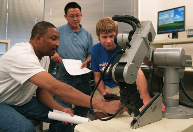 Students working with equipment.