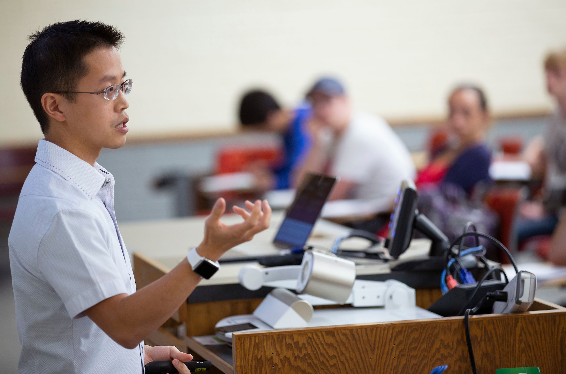 Jason Chan asks questions throughout his class lecture to help students learn the material. Photo by Christopher Gannon