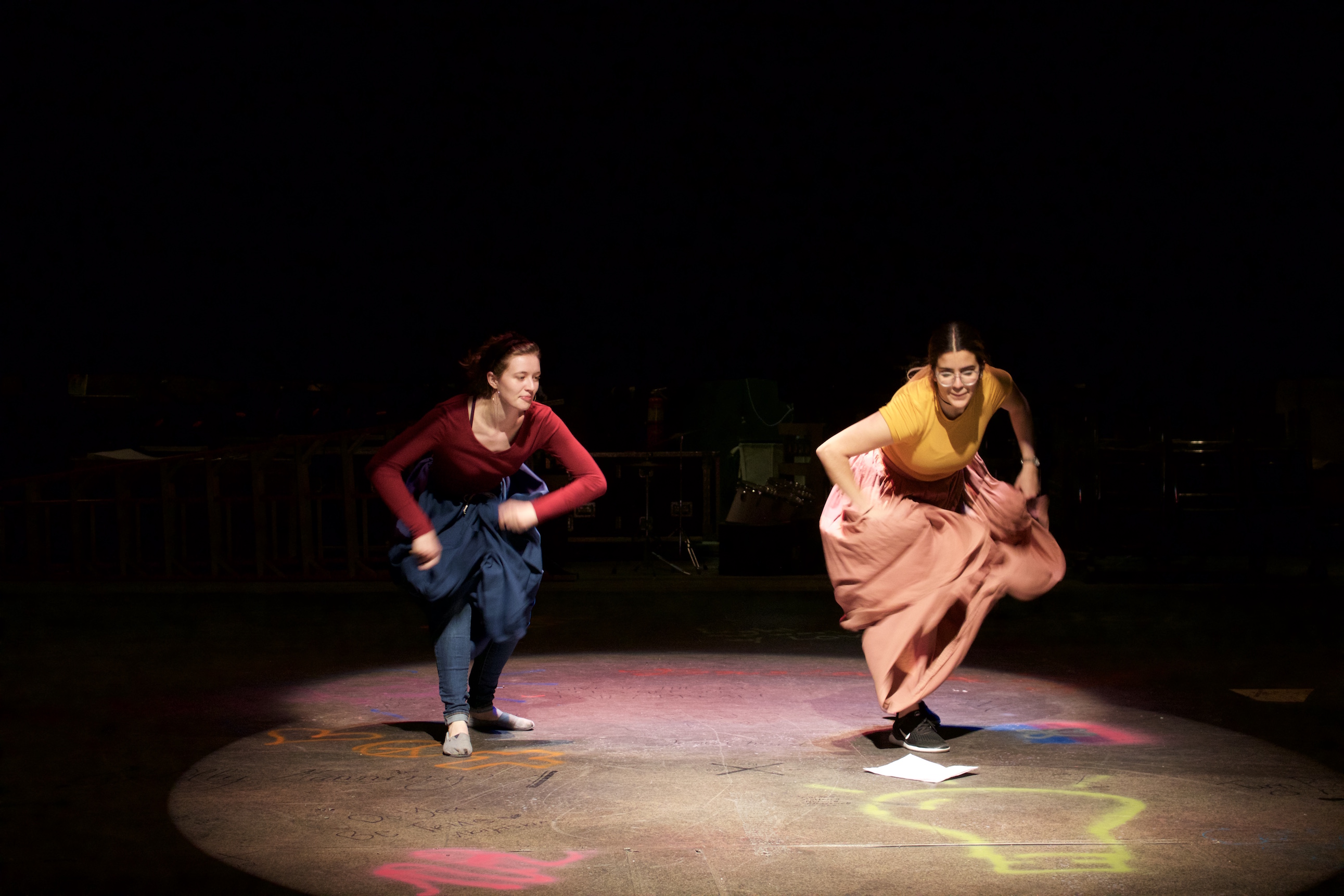 Students performing on stage.