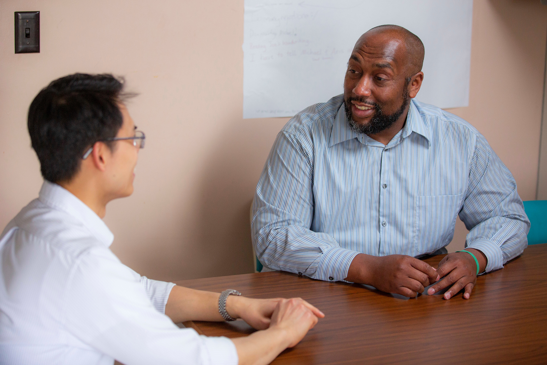 Math professor Michael Young advises student Kevin Liu