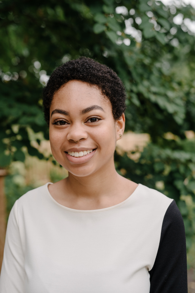 Portrait of student outside in front of tree