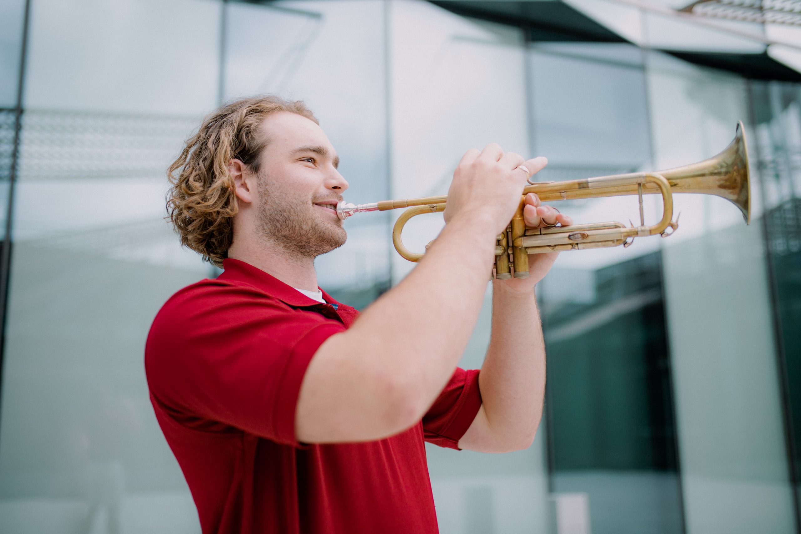 Jacob Schmieder plays a trumpet.