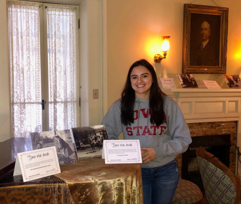 Senior Madisyn Rostro inside the Farm House Museum on campus