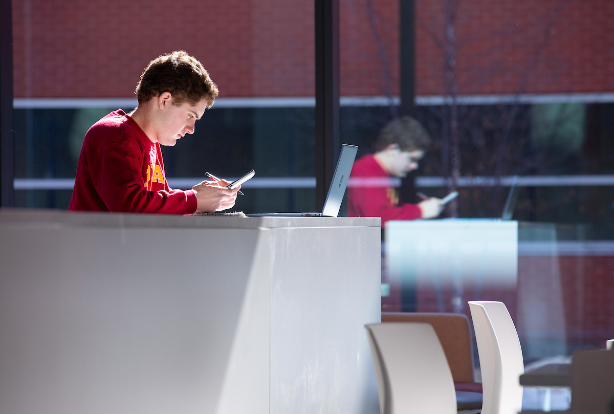 Student looking at cell phone.