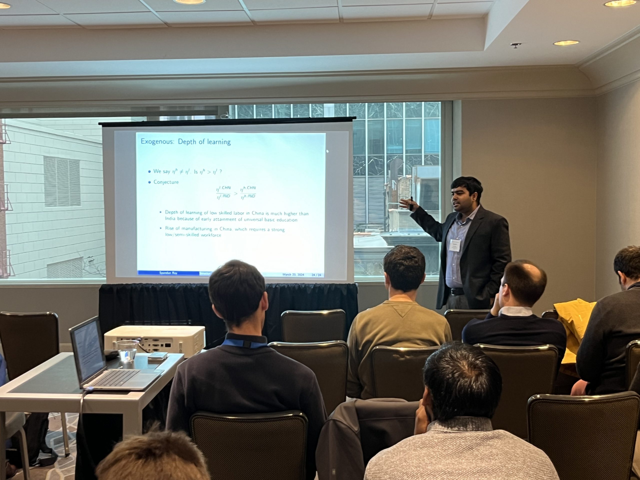 Spandan Roy presents his research at the Midwest Economics Association conference