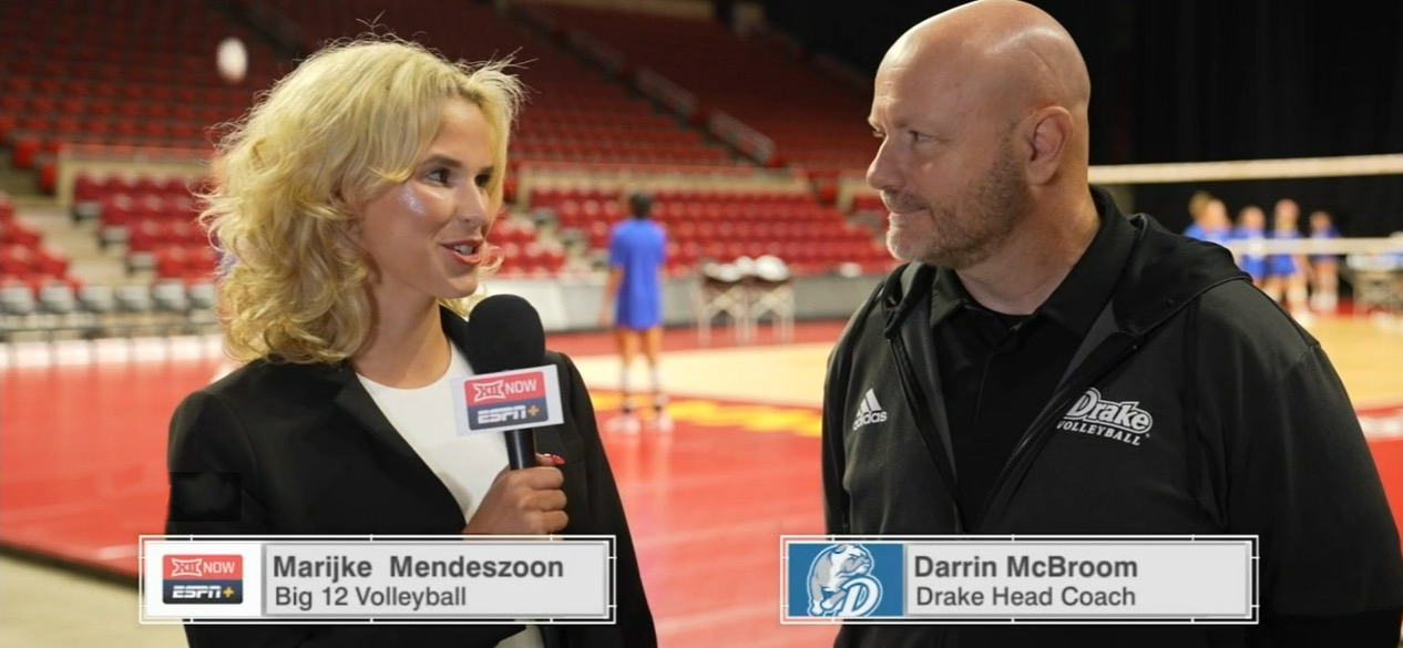 Junior in journalism and mass communication, Marijke Mendeszoon, interviews Drake head coach Darrin McBroom on an ESPN+ broadcast at Hilton Coliseum.