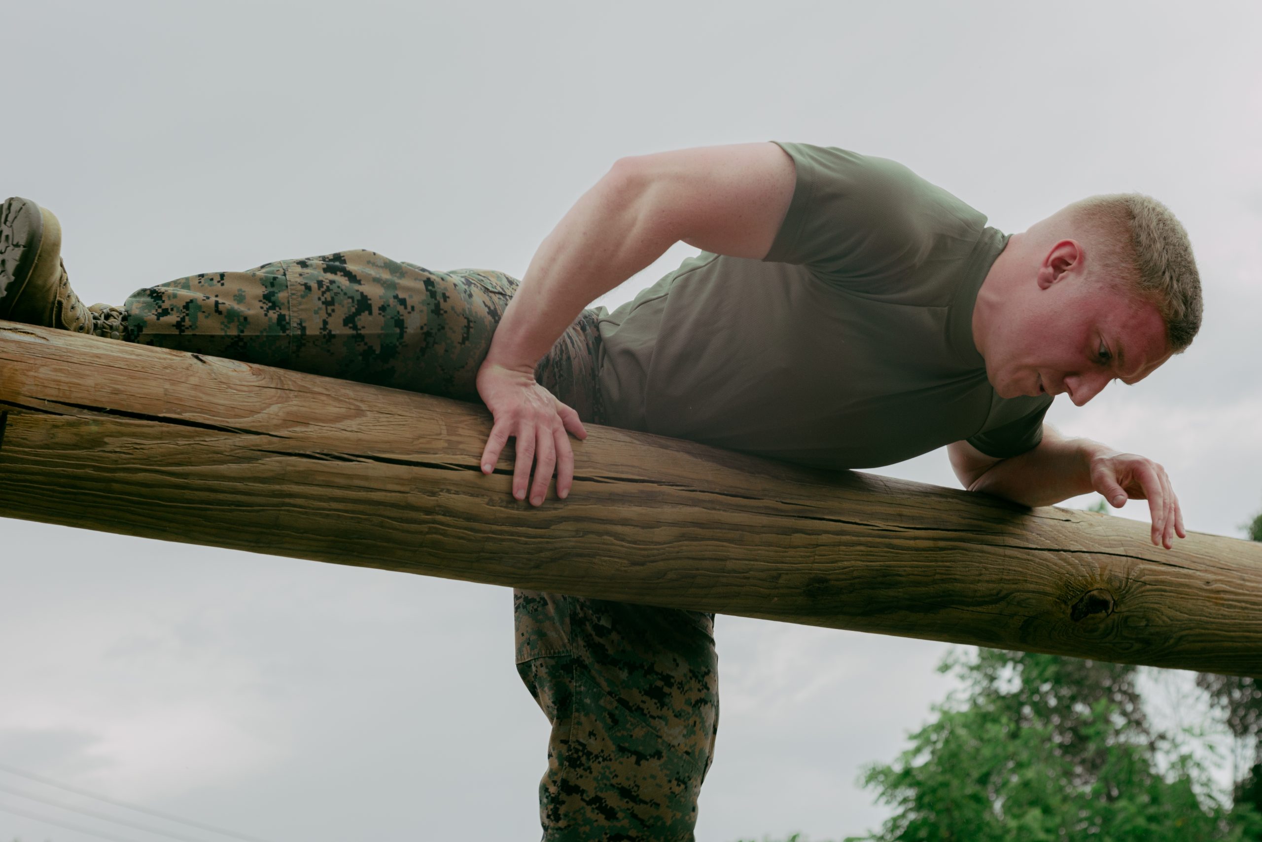 An ROTC student navigates an obstacle at the Lt. Col. Richard Burnett Sr. USMC Memorial Obstacle Course at Iowa State University.