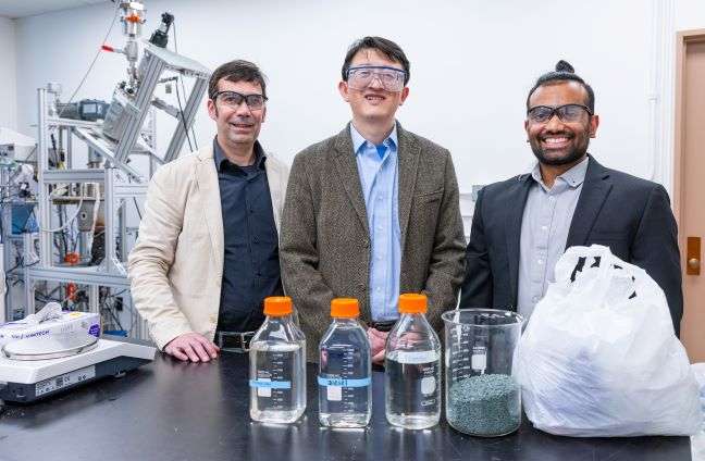 The Upcycling+ co-founders with their Spedding Hall reactor and products, left to right, Aaron Sadow, Wenyu Huang and Akalanka Tennakoon.