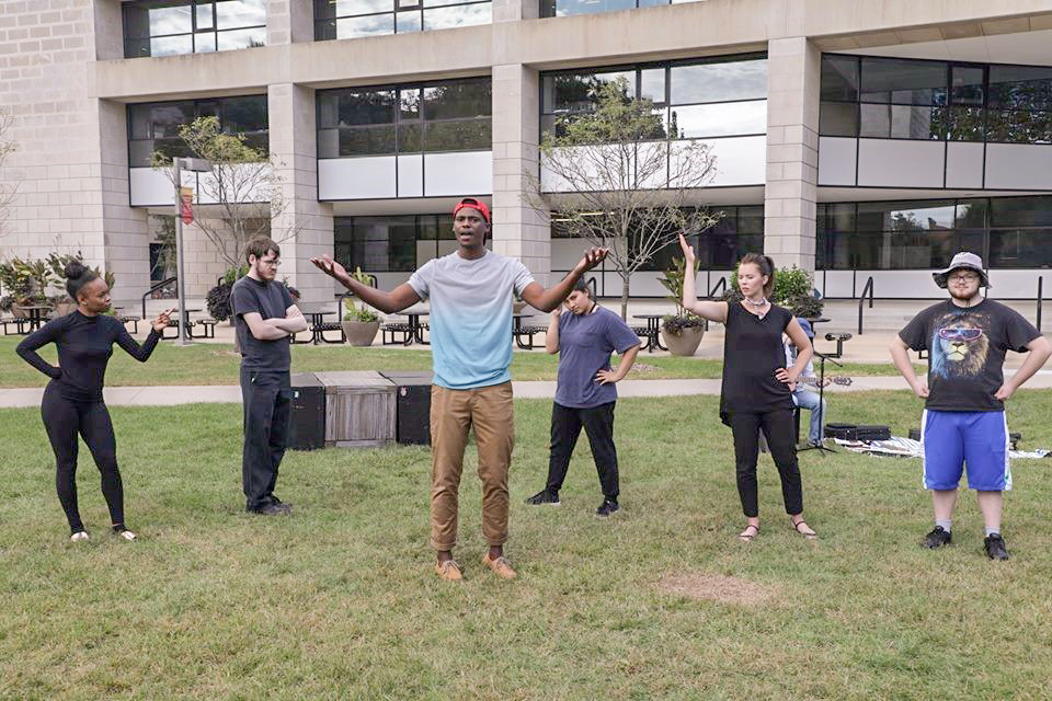 Students performing outside Parks Library