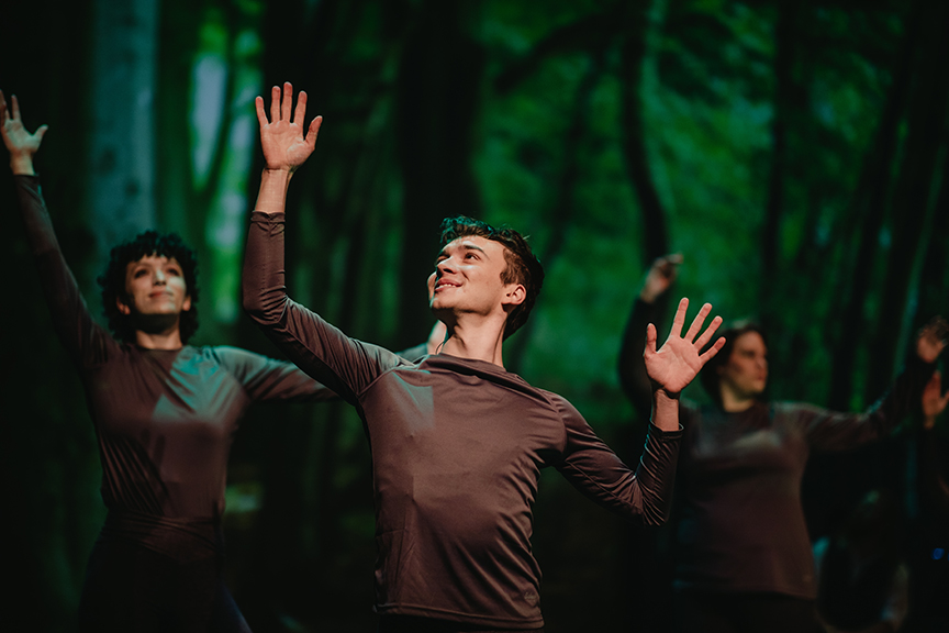 A cast member dances in the staged forest in "BABA."