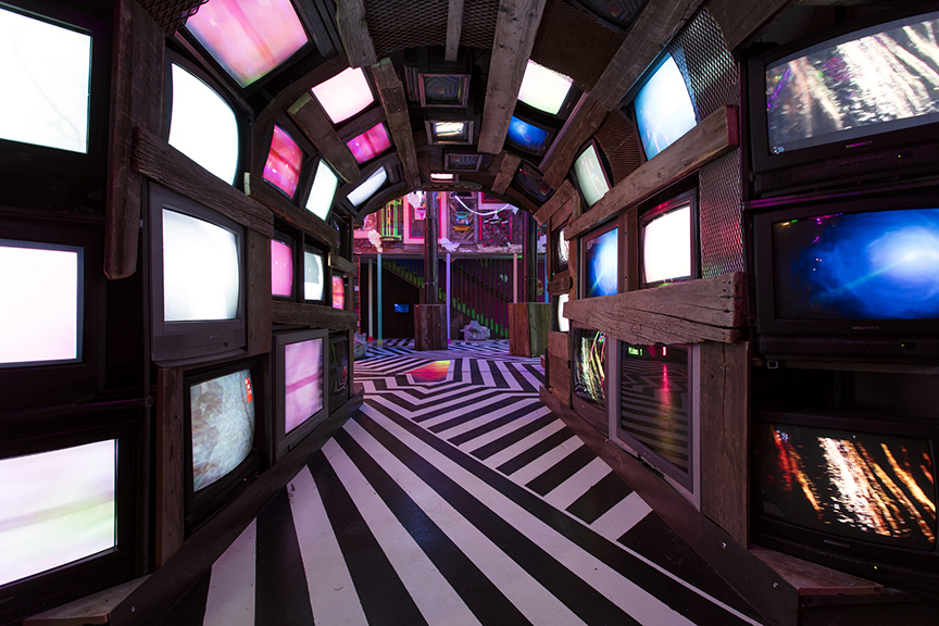 TV Tunnel display at The House of Eternal Return, Meow Wolf’s Santa Fe exhibition.