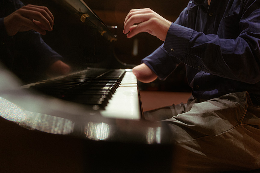 Jarod Hart playing the piano.