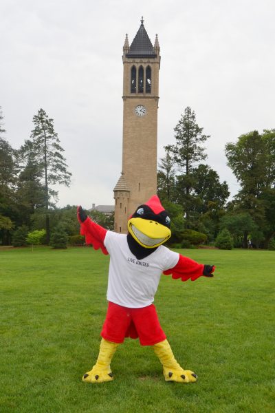 Cy standing by Campanile near Central Campus