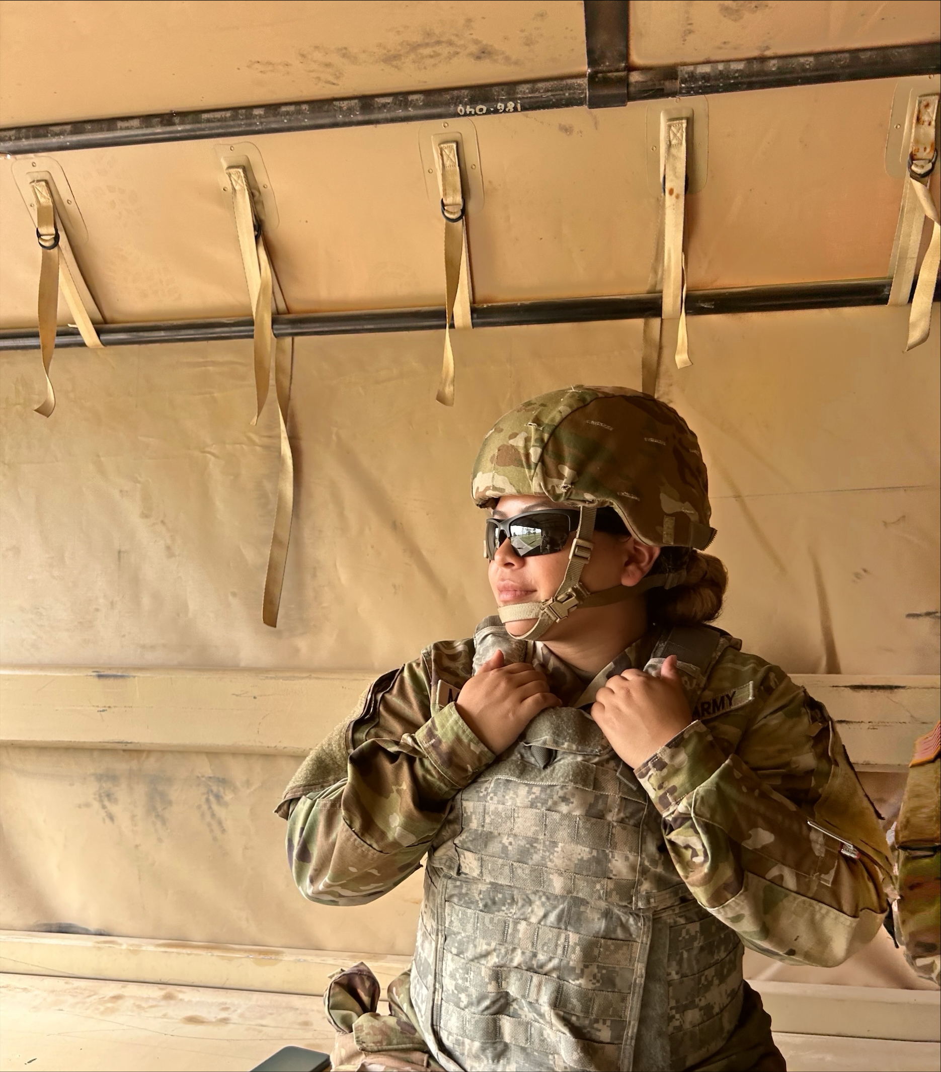 female student in army fatigues